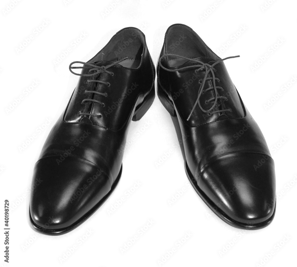 Pair of man's black shoes isolated on white background Pair of man's black shoes isolated on white background