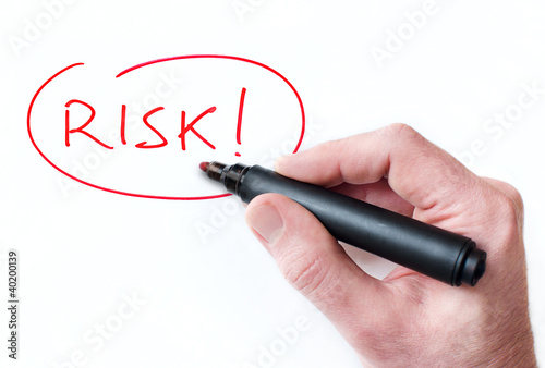 Hand writing Risk on whiteboard