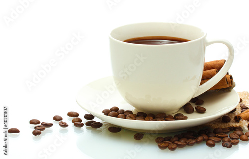 cup of coffee, beans and cinnamon sticks isolated on white