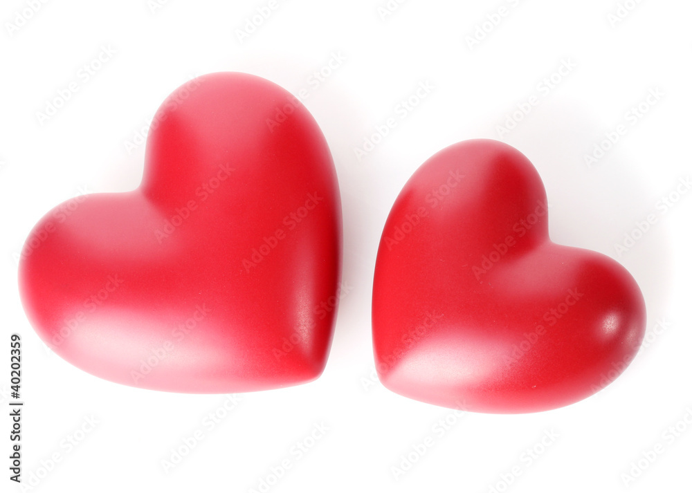 two decorative red hearts isolated on white. two decorative red hearts isolated on white.