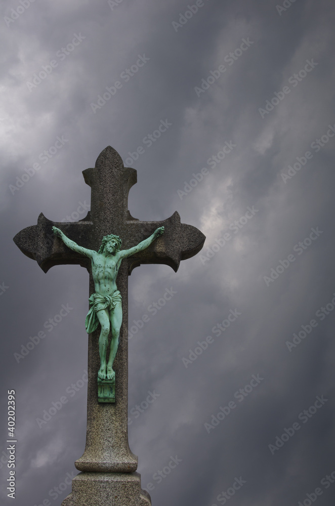 Copper statue of Jesus crucified on a cross