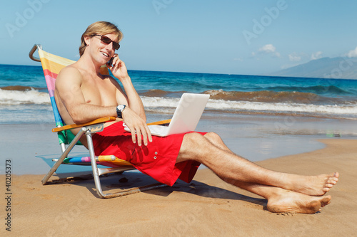 Business Man on the Beach in Hawaii © EpicStockMedia