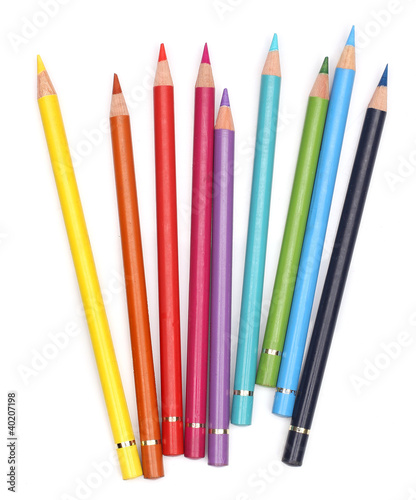 Color pencils over white background photo
