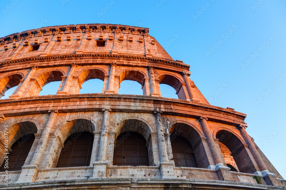 Obraz premium Colosseum at sunset