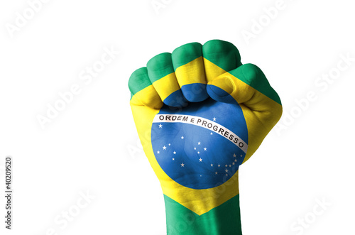 Fist painted in colors of brazil flag