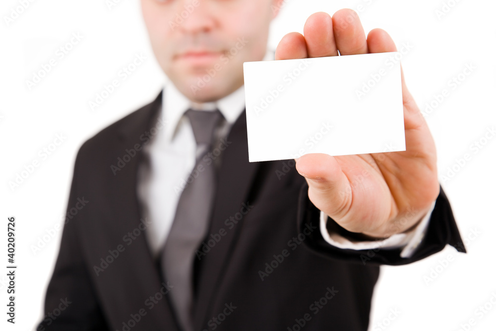 Businessman in black suit offering card, isolated over white bac Businessman in black suit offering card, isolated over white bac