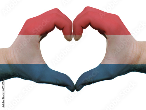 Heart and love gesture in netherlands flag colors by hands isola