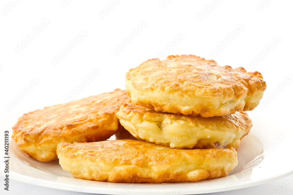 fried fritters on a white plate fried fritters on a white plate
