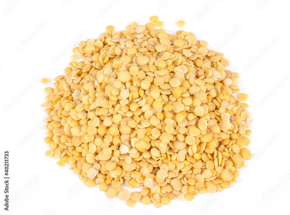 Yellow lentils isolated on white background.Macro shot Yellow lentils isolated on white background.Macro shot