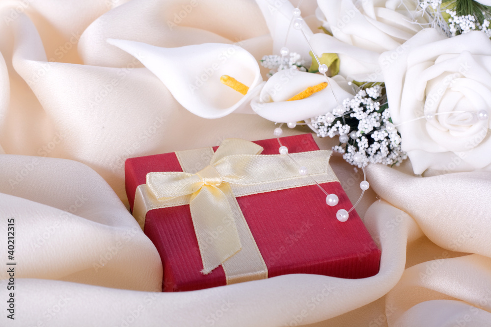 Holiday gift with a bouquet of the bride
