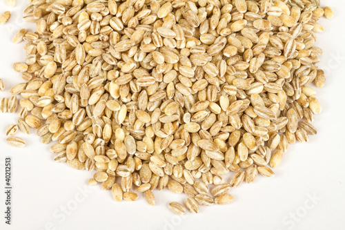 Pearl barley heap isolated on white