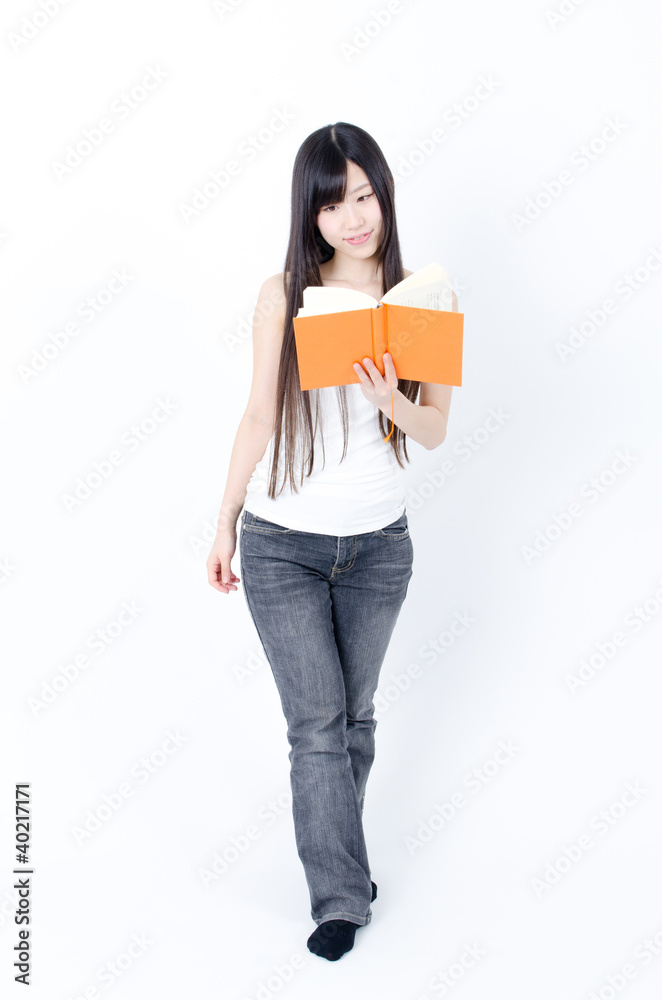 attractive asian woman reading a book attractive asian woman reading a book
