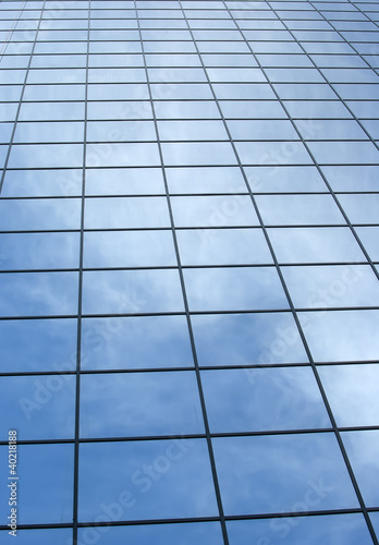 Modern office building with blue square windows.