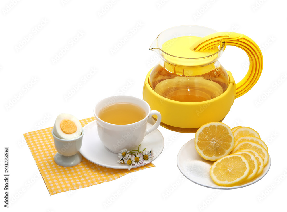 Tea with lemon on a white background Tea with lemon on a white background