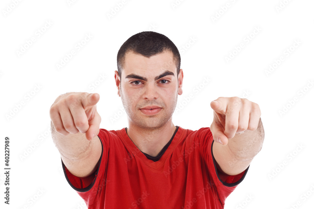 Portrait of young man pointing at you Portrait of young man pointing at you