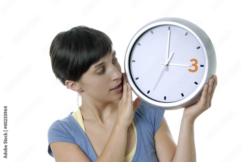 holding a clock