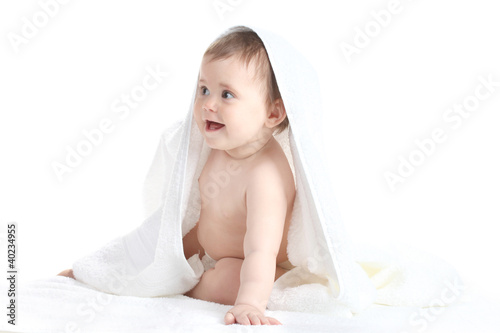 Cute baby girl with towel i...