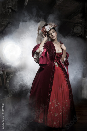 Beauty woman wearing old fashioned dress