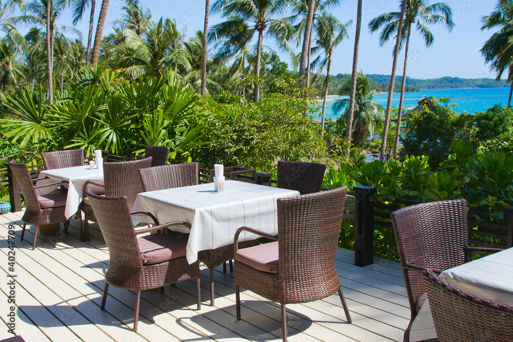 Table and chairs with a beautiful sea view . Thailand . Table and chairs with a beautiful sea view . Thailand .