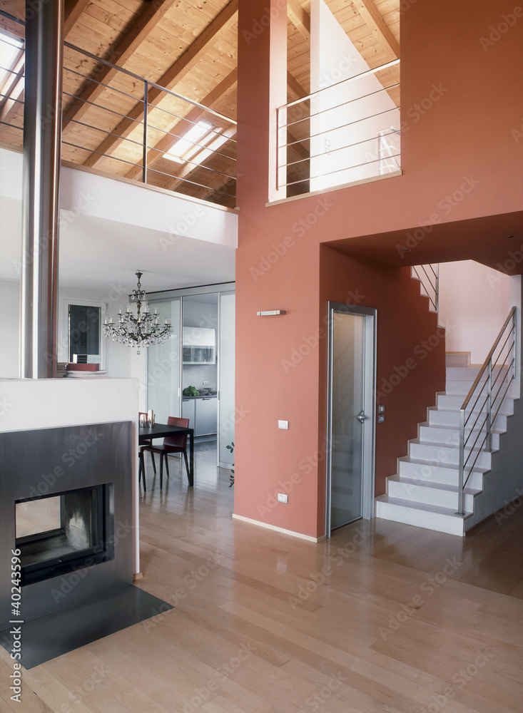 moderno soggiorno con camino, scala e parquet Stock Photo | Adobe Stock