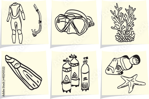 Diving equipment and sea life on yellow memo sticks