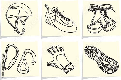 Mountain climbing equipment on yellow memo sticks