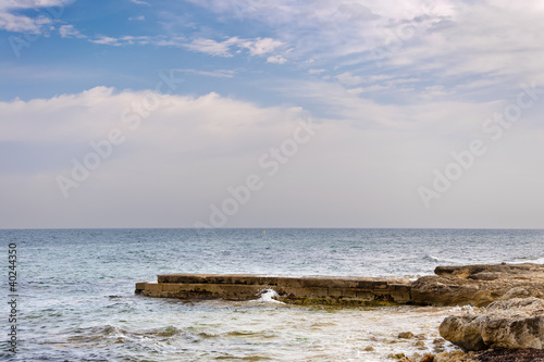 Breakwater by the Mediterranean Sea. © ihervas