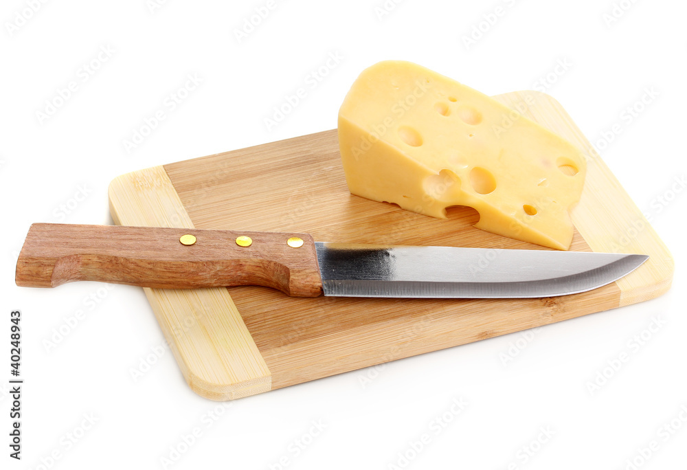 Cheese on cutting board with knife isolated on white Cheese on cutting board with knife isolated on white
