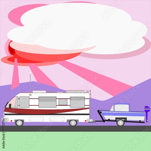 Motor home towing boat at sunset