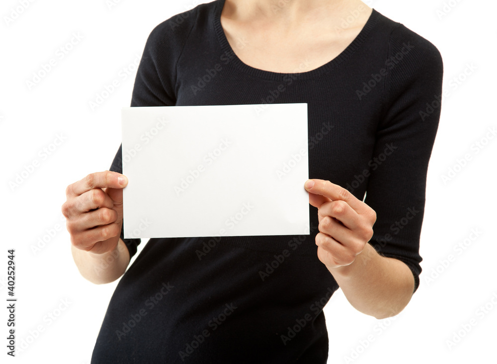 Woman's hands holding blank sheet of paper Woman's hands holding blank sheet of paper