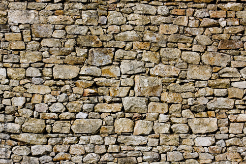 part of a stone wall  for background or texture.