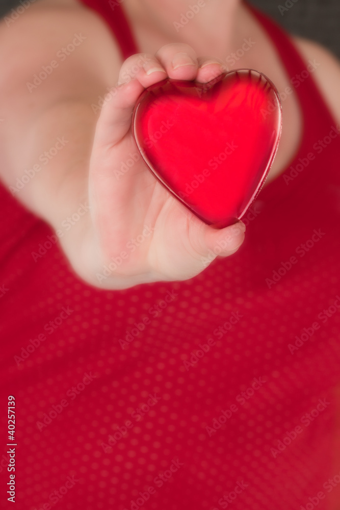 Hand holding a heart Hand holding a heart