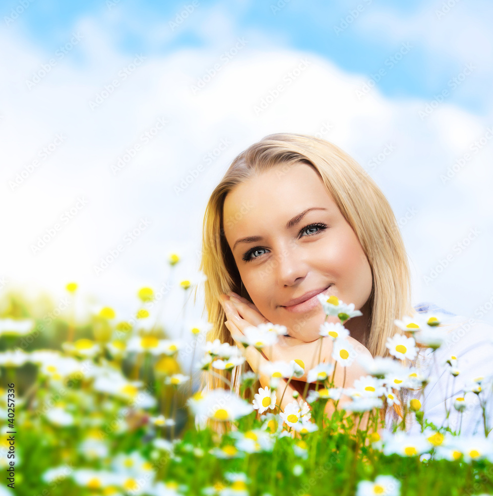 Beautiful woman enjoying daisy field and blue sky Beautiful woman enjoying daisy field and blue sky