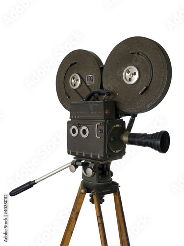 Old movie camera isolated on white