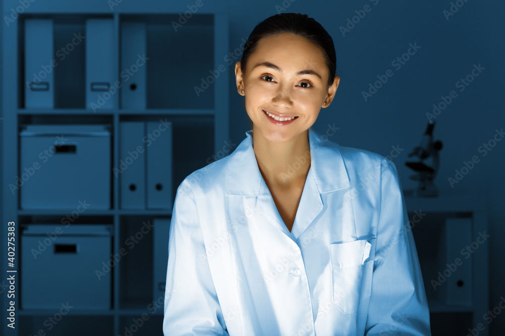 Young chemist working in laboratory Young chemist working in laboratory