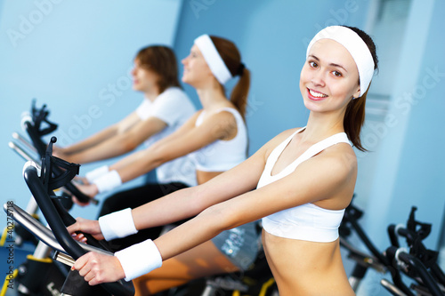 Young woman doing sport in gym