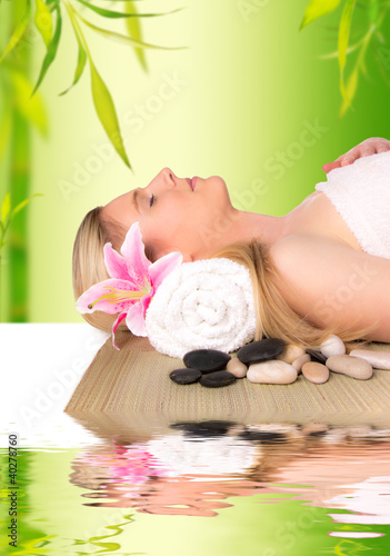 Beautiful blond girl relaxing, concept of spa