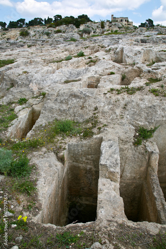 Bild auf Leinwand Punic archaeological site and modern industrial.