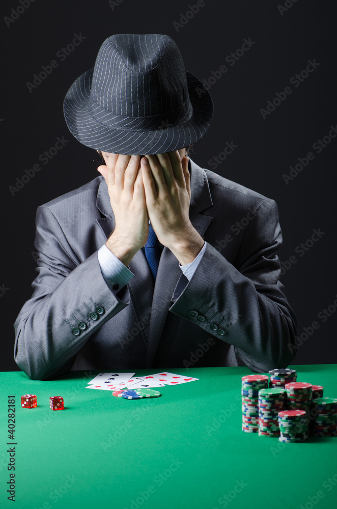 Man playing in the casino Man playing in the casino