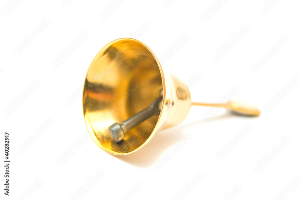Golden handbell close-up on white Golden handbell close-up on white
