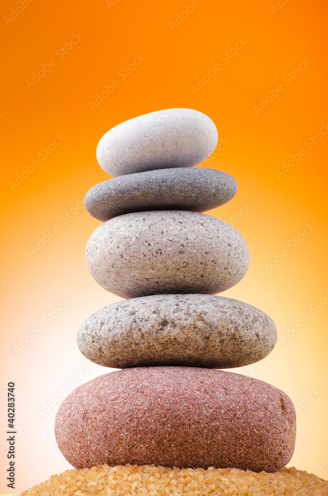 Balanced pebbles with colour background Balanced pebbles with colour background