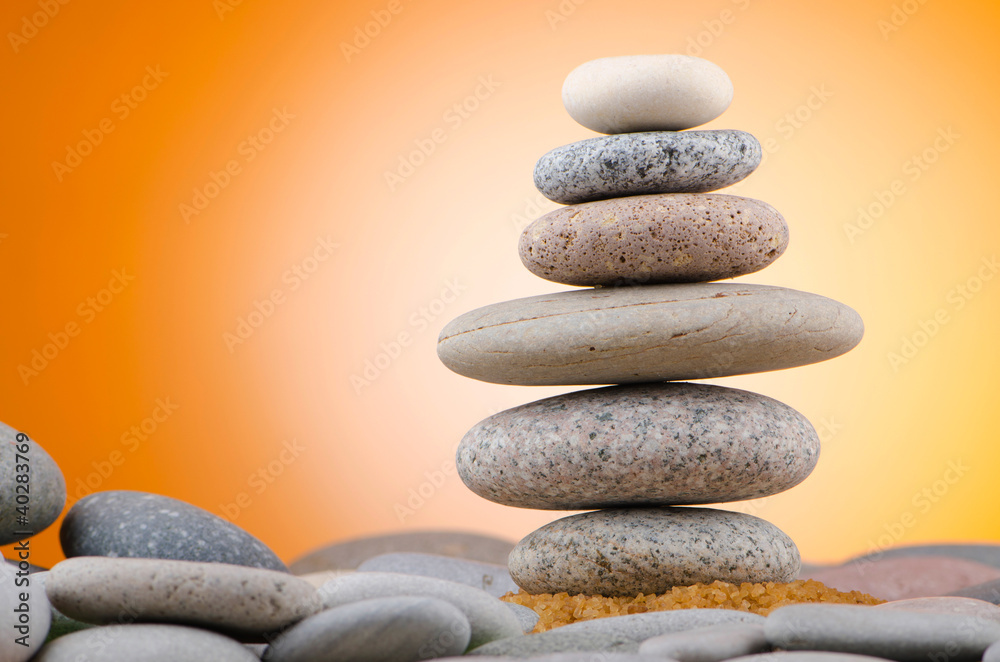 Balanced pebbles with colour background Balanced pebbles with colour background