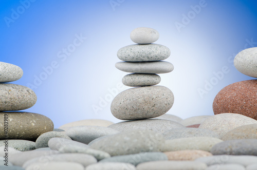 Pebbles stack against gradient background