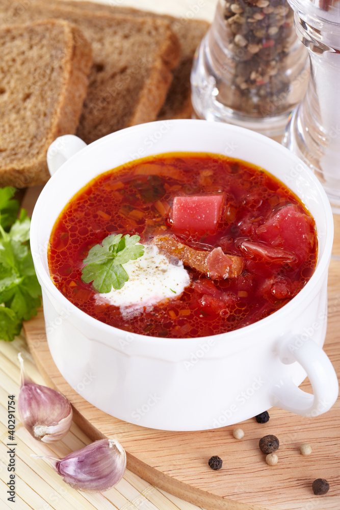 Russian cuisine. Borsch in a white tureen Russian cuisine. Borsch in a white tureen