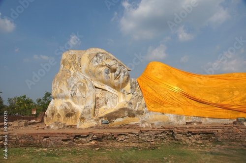 Lying buddha figure at wat lokayasutharam photo