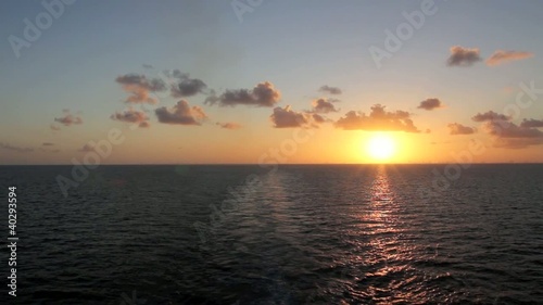 View Across Calm Ocean Towards the Sunset