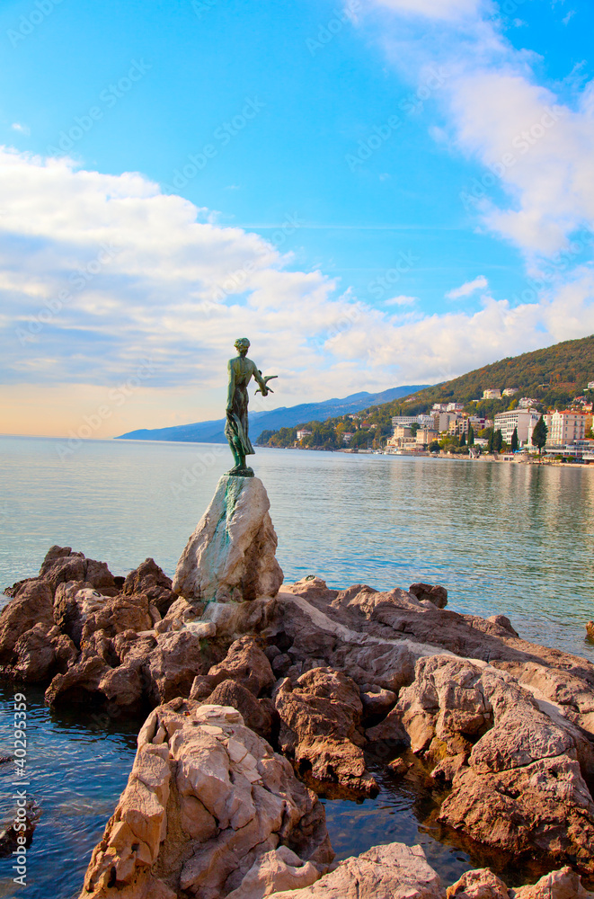 Naklejka premium Opatija in Croatia. Sculpture of the woman with the sea.
