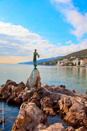 Opatija in Croatia. Sculpture of the woman with the sea. photo