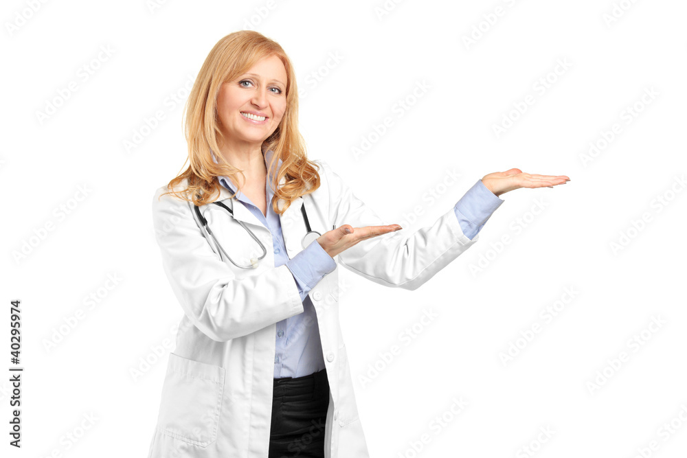 A smiling mature healthcare practitoner gesturing A smiling mature healthcare practitoner gesturing