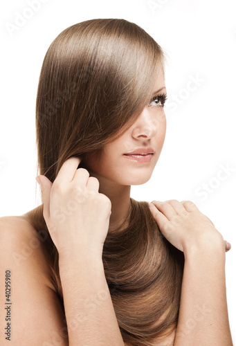 beautiful young woman with elegant long shiny hair